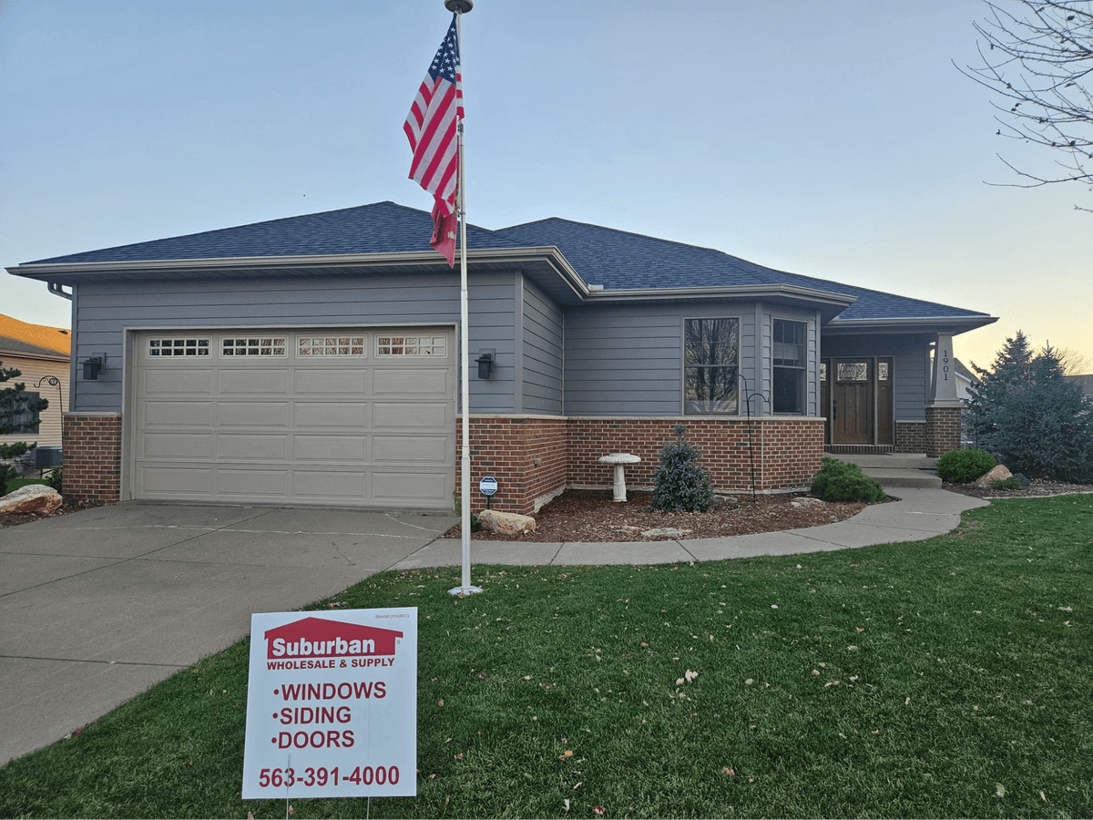 Composite siding installed on Quad Cities home by Suburban Construction