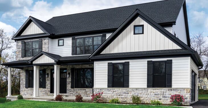 Composite siding with wood grain texture