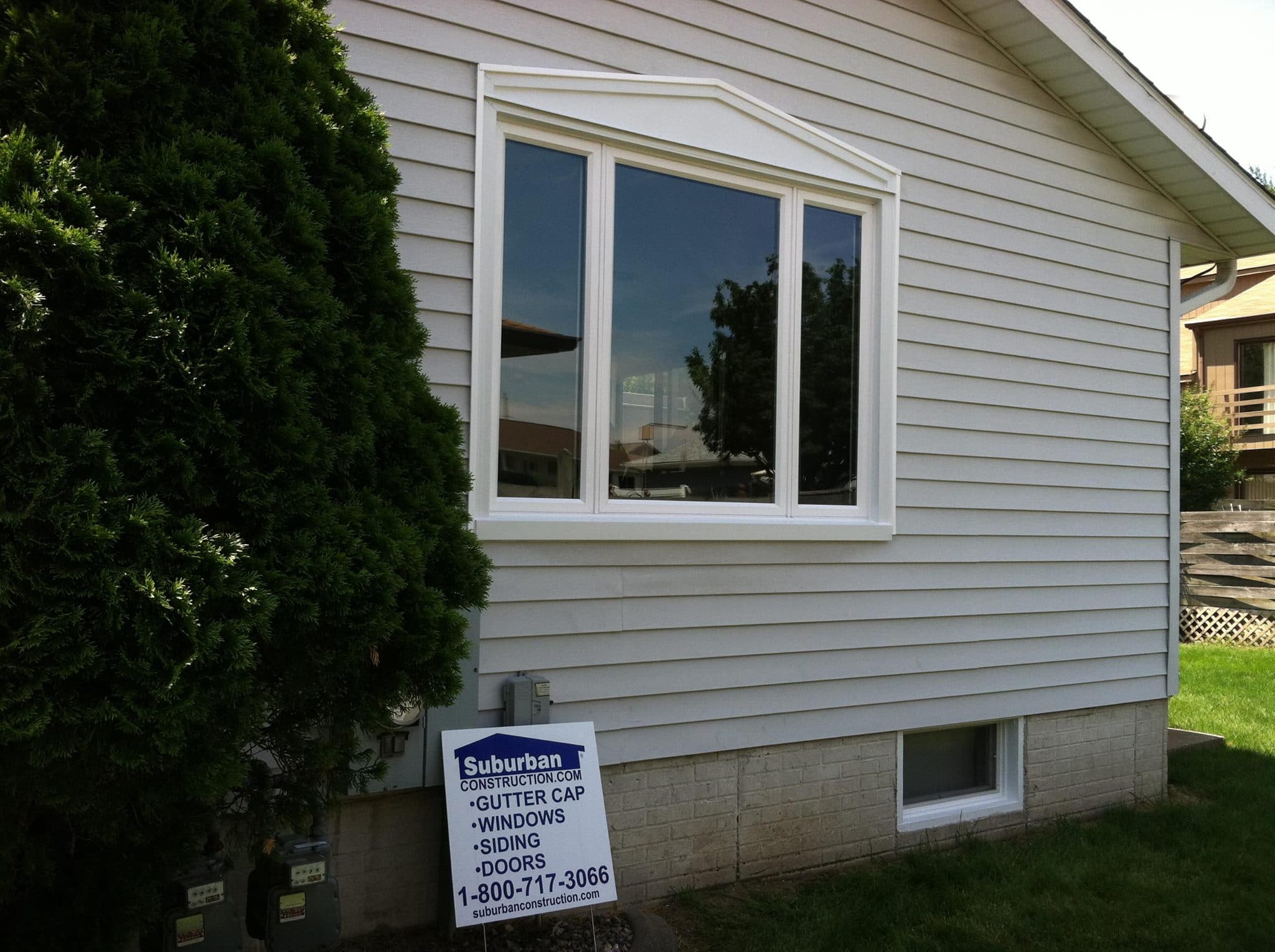 Casement window group installed on a home exterior