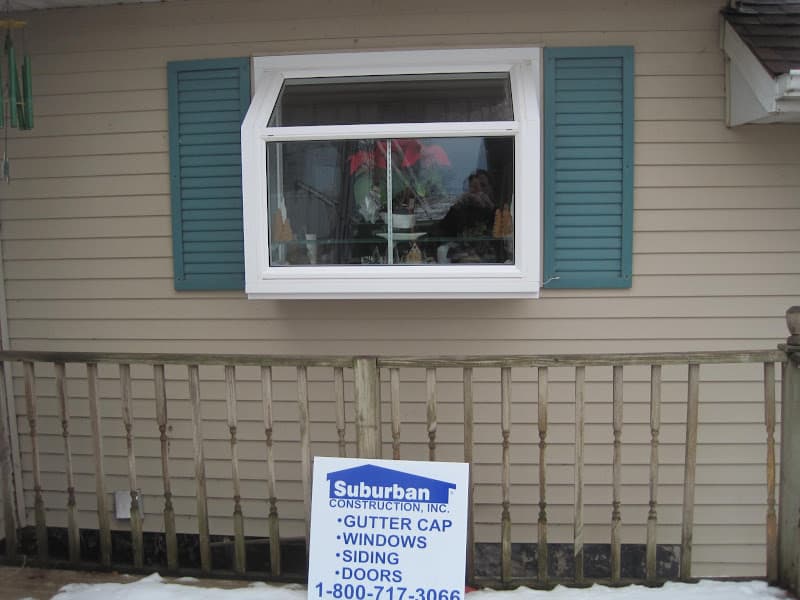 Garden and specialty window installed on a home exterior
