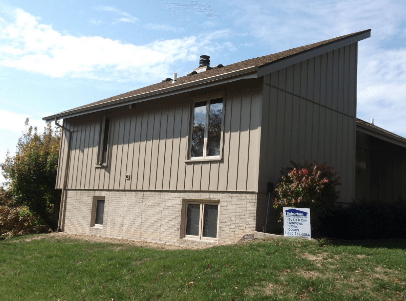Steel siding installed on home showing durable impact-resistant finish