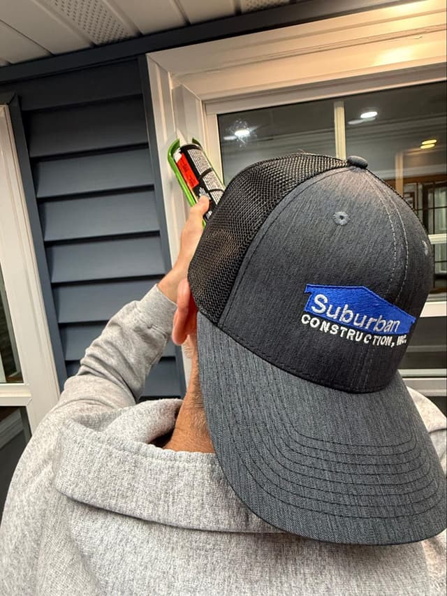 New replacement window being set into rough opening during installation