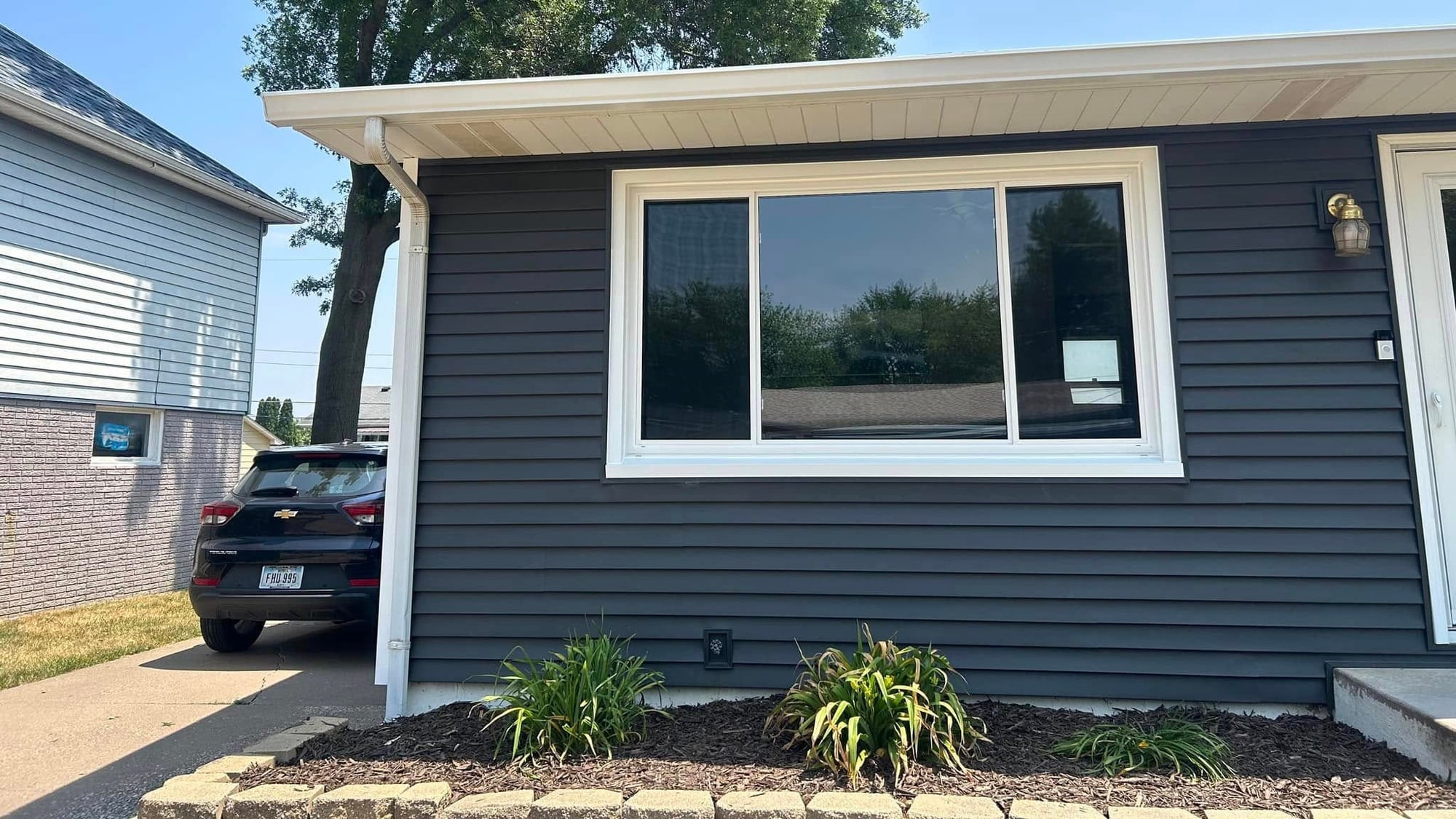 What Are the Best Windows for Living Rooms with Lots of Sun? | Quad Cities Window Guide